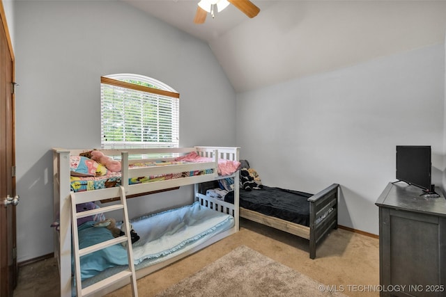 bedroom featuring carpet, ceiling fan, and lofted ceiling
