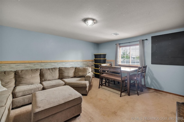 carpeted living room with visible vents