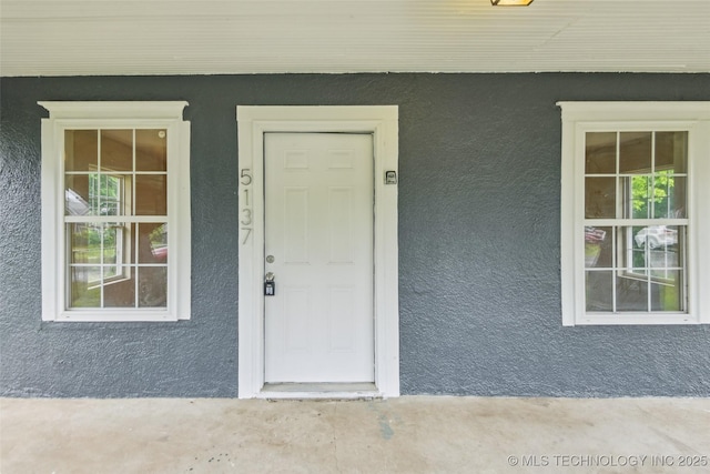5137 W 6th St, Tulsa, OK 74127 - view of exterior entry with stucco siding