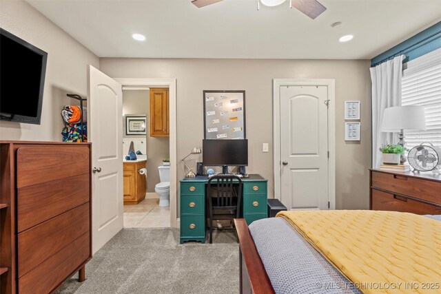 bedroom with light colored carpet, recessed lighting, connected bathroom, and ceiling fan