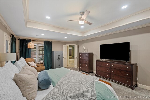 carpeted bedroom with visible vents, recessed lighting, crown molding, and a tray ceiling