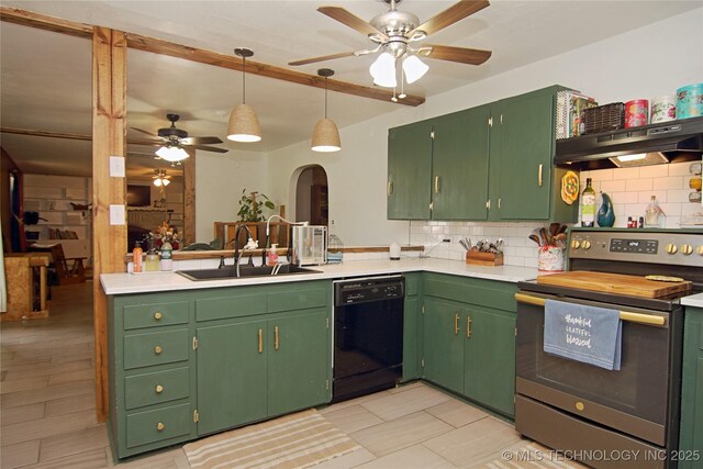 74703 S 320th Rd, Wagoner, OK 74467 - kitchen with ceiling fan, stainless steel electric range, dishwasher, a sink, and under cabinet range hood