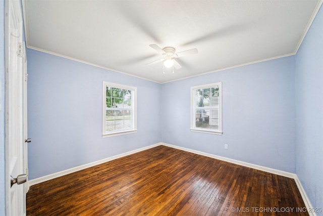 spare room featuring a ceiling fan, dark wood finished floors, baseboards, and ornamental molding