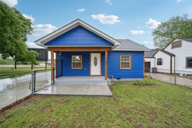 bungalow-style house with a porch, a gate, a front lawn, and fence