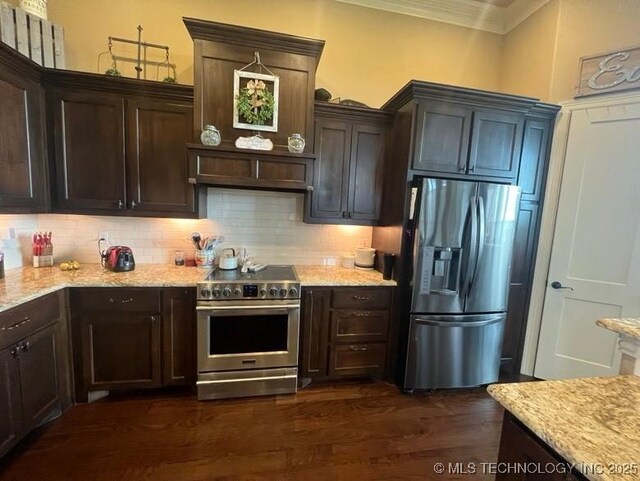6735 Wilson, Durant, OK 74701 - kitchen with crown molding, backsplash, dark brown cabinets, and stainless steel appliances