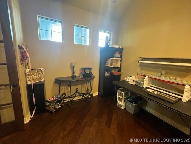 office featuring baseboards and dark wood finished floors
