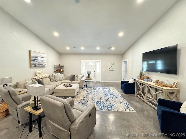 living room featuring high vaulted ceiling, recessed lighting, and finished concrete floors