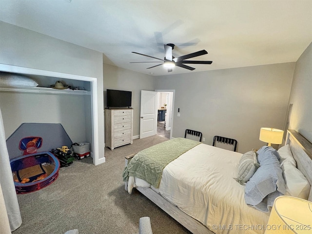 carpeted bedroom featuring ceiling fan