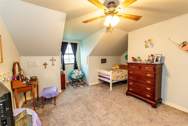 bedroom with baseboards, light carpet, and lofted ceiling