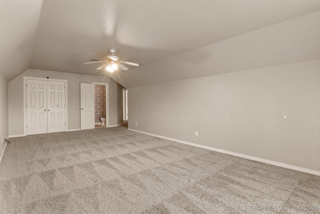 13303 E 95th Pl N, Owasso, OK 74055 - additional living space featuring ceiling fan, visible vents, baseboards, lofted ceiling, and carpet flooring