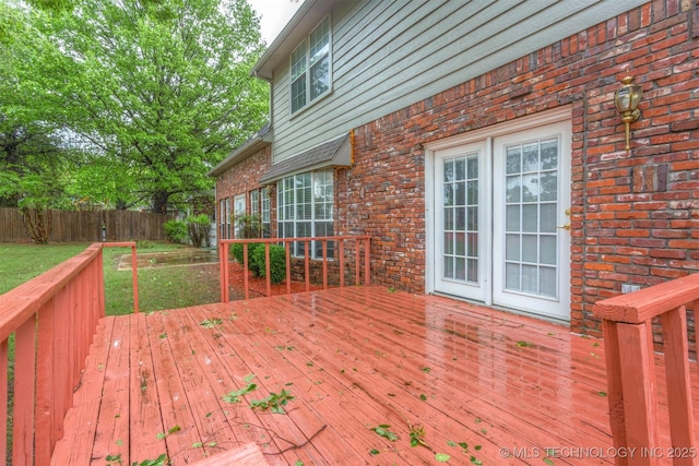 13303 E 95th Pl N, Owasso, OK 74055 - wooden terrace featuring a lawn and fence