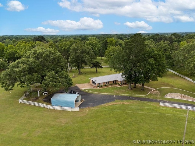 aerial view with a wooded view