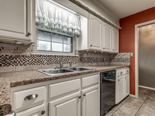 kitchen featuring a sink, dishwasher, white cabinets, and tasteful backsplash