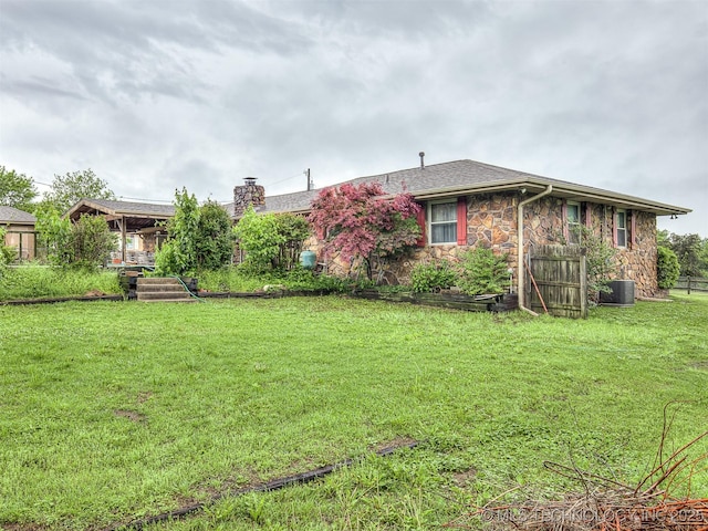 view of yard featuring central AC
