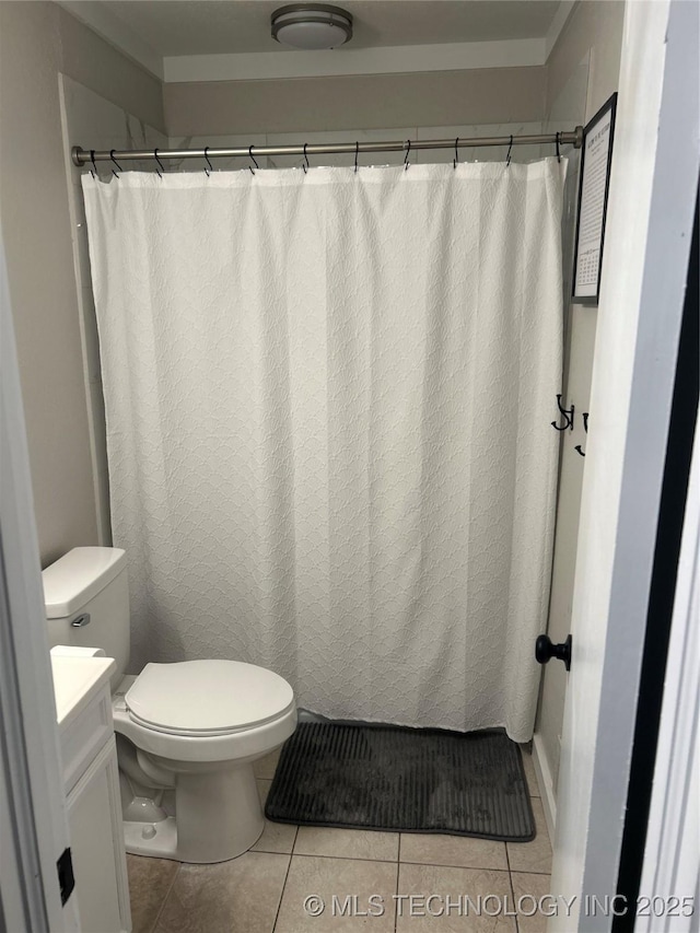 1705 Tower Dr, Ardmore, OK 73401 - bathroom featuring tile patterned flooring, toilet, and vanity