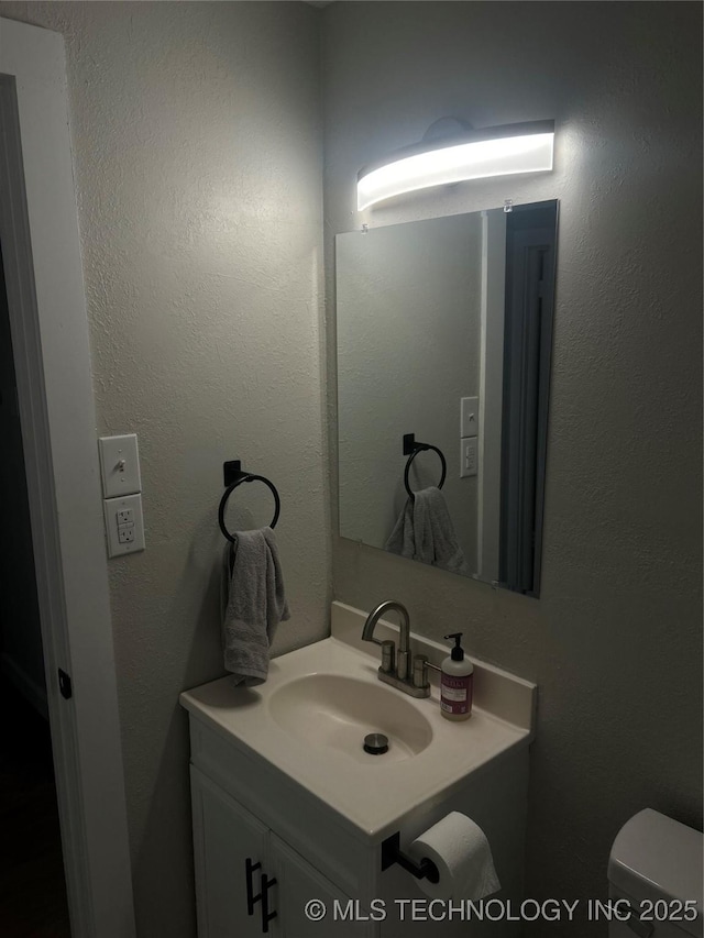 1705 Tower Dr, Ardmore, OK 73401 - bathroom with vanity and toilet