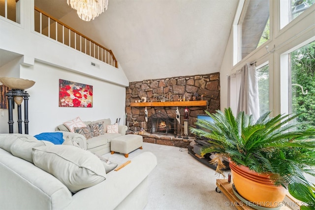 25805 S Clayton Ave, Claremore, OK 74019 - carpeted living area featuring a notable chandelier, high vaulted ceiling, visible vents, and a fireplace