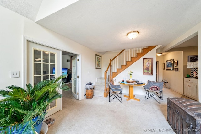 25805 S Clayton Ave, Claremore, OK 74019 - interior space featuring stairway, carpet flooring, and a textured ceiling