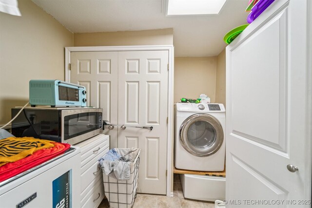25805 S Clayton Ave, Claremore, OK 74019 - washroom featuring laundry area, washer / dryer, and light tile patterned floors