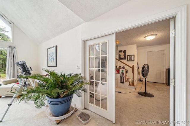 25805 S Clayton Ave, Claremore, OK 74019 - doorway with carpet floors and a textured ceiling
