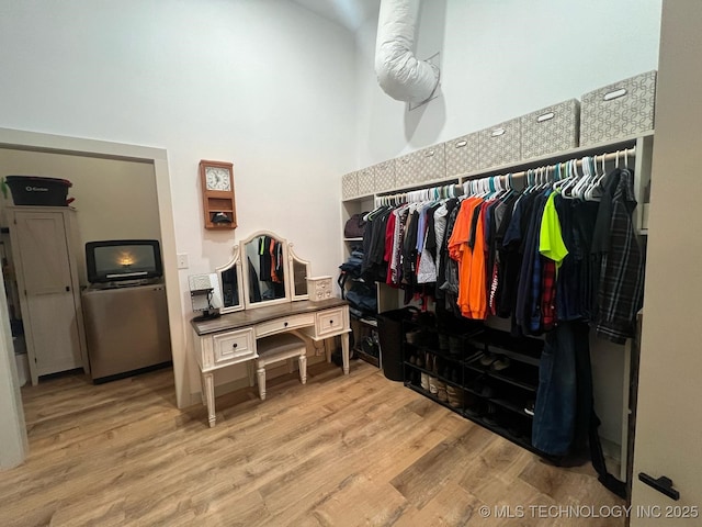 spacious closet with wood finished floors
