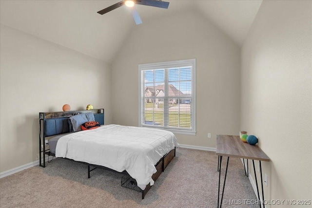 bedroom featuring baseboards, ceiling fan, carpet, and vaulted ceiling