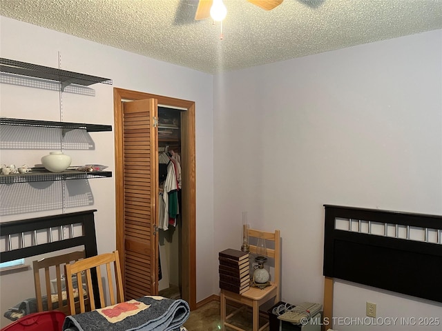 16 B St NW, Inola, OK 74036 - bedroom featuring a ceiling fan, a closet, and a textured ceiling