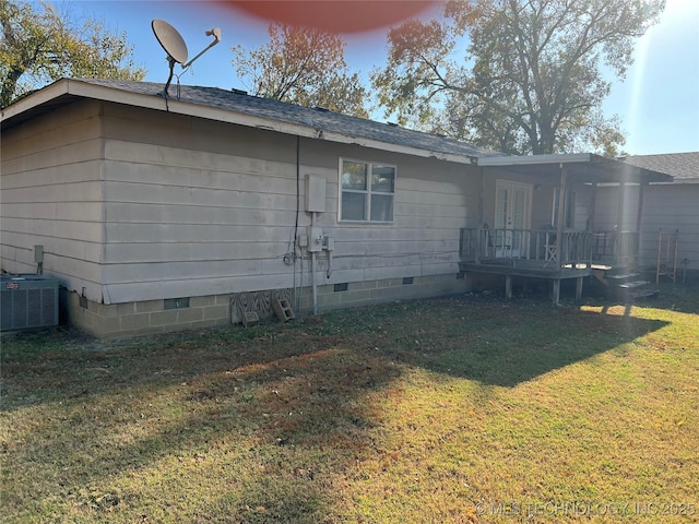 16 B St NW, Inola, OK 74036 - rear view of house featuring a lawn, crawl space, a wooden deck, and a shingled roof