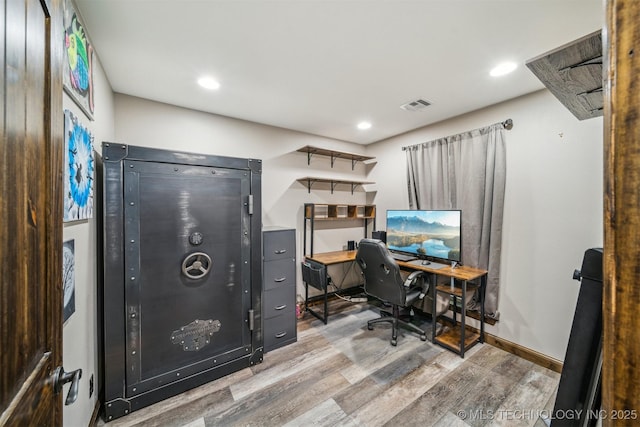 office area featuring recessed lighting, visible vents, and wood finished floors