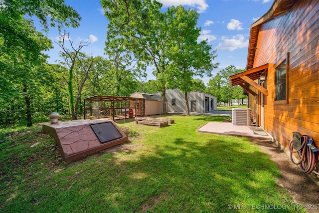 view of yard with an outdoor structure and cooling unit