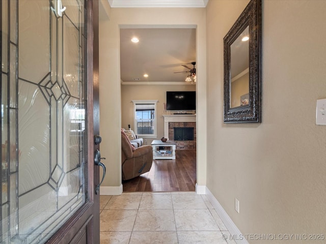 5406 Ashbrook Dr, Bartlesville, OK 74006 - hall featuring baseboards, ornamental molding, and light tile patterned floors