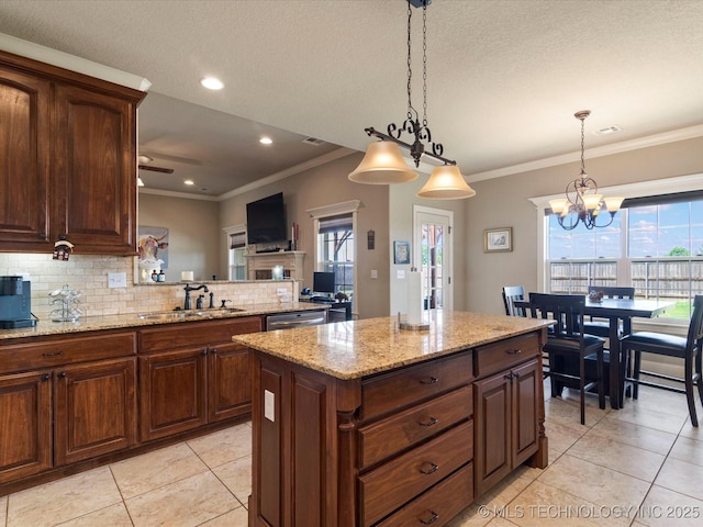 5406 Ashbrook Dr, Bartlesville, OK 74006 - kitchen featuring light tile patterned flooring, ornamental molding, decorative backsplash, and a sink