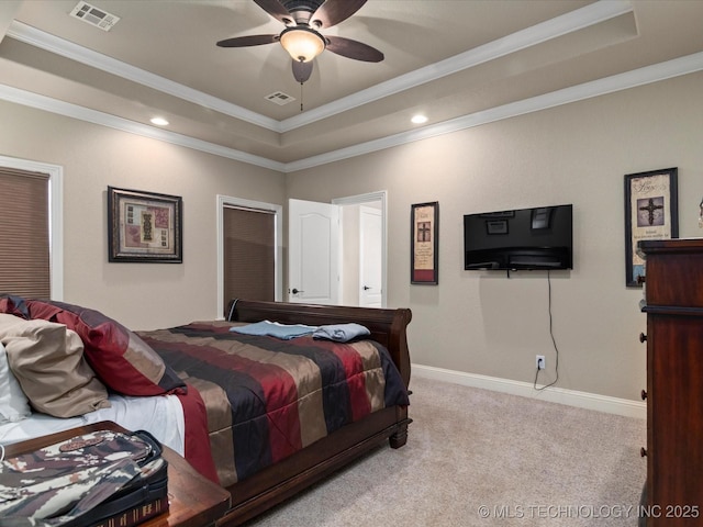 5406 Ashbrook Dr, Bartlesville, OK 74006 - carpeted bedroom featuring visible vents, recessed lighting, a raised ceiling, and crown molding