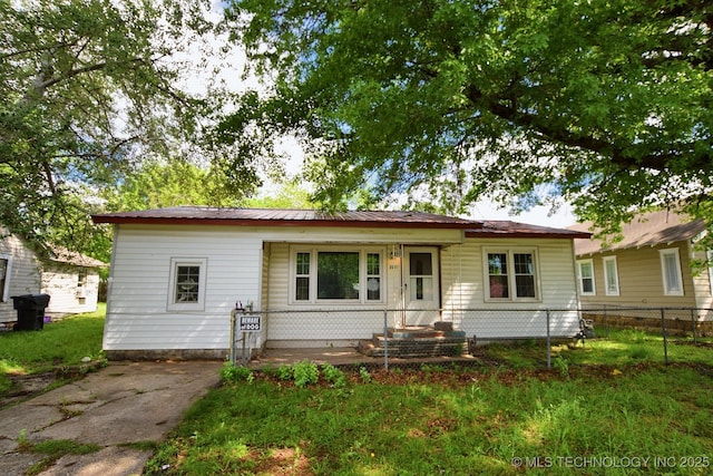 2212 Monta Ave, Muskogee, OK 74403 - rear view of house featuring fence