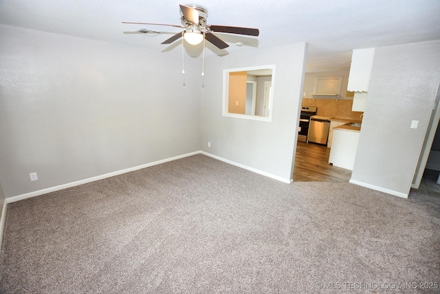 2212 Monta Ave, Muskogee, OK 74403 - unfurnished living room featuring carpet floors, ceiling fan, baseboards, and visible vents