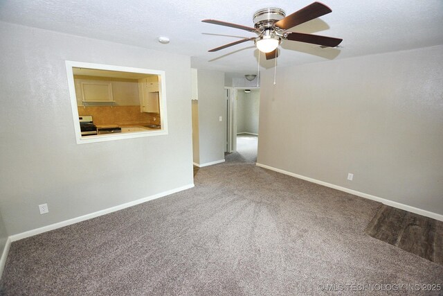 2212 Monta Ave, Muskogee, OK 74403 - carpeted empty room with a ceiling fan and baseboards