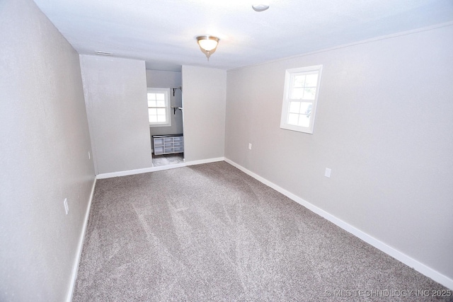 2212 Monta Ave, Muskogee, OK 74403 - carpeted empty room featuring baseboards