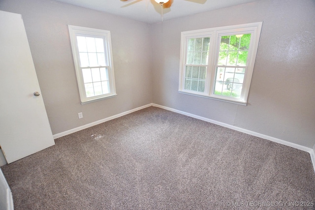 2212 Monta Ave, Muskogee, OK 74403 - carpeted spare room featuring plenty of natural light, a ceiling fan, and baseboards