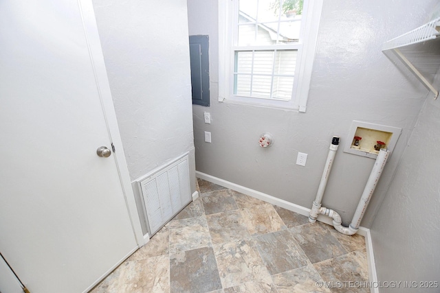 2212 Monta Ave, Muskogee, OK 74403 - washroom with hookup for an electric dryer, laundry area, stone finish flooring, visible vents, and hookup for a washing machine