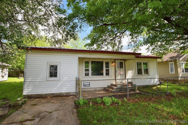 2212 Monta Ave, Muskogee, OK 74403 - view of front facade with fence