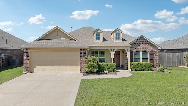 view of front of property with a shingled roof and brick siding