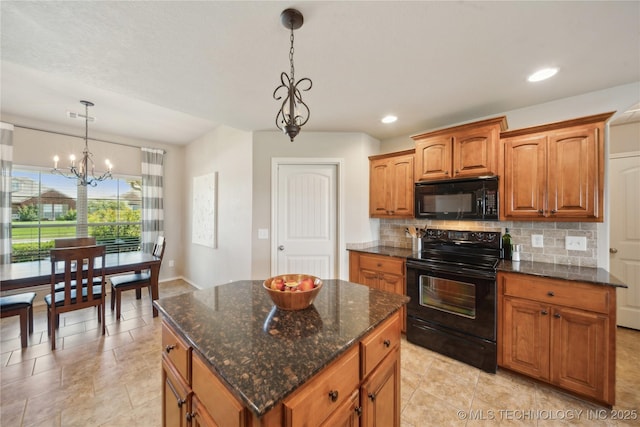 kitchen featuring an inviting chandelier, brown cabinetry, tasteful backsplash, black appliances, and hanging light fixtures