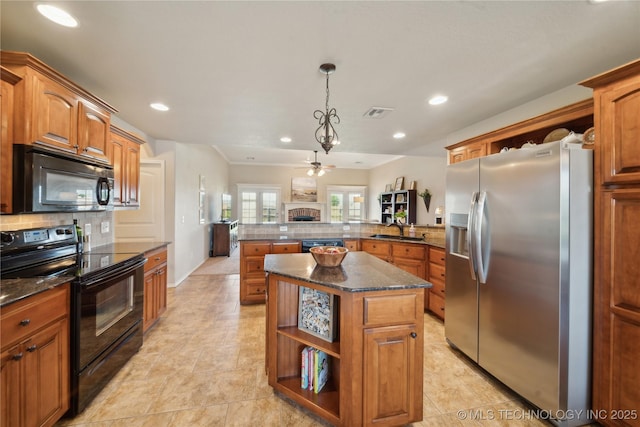 kitchen featuring open shelves, a peninsula, recessed lighting, a sink, and black appliances