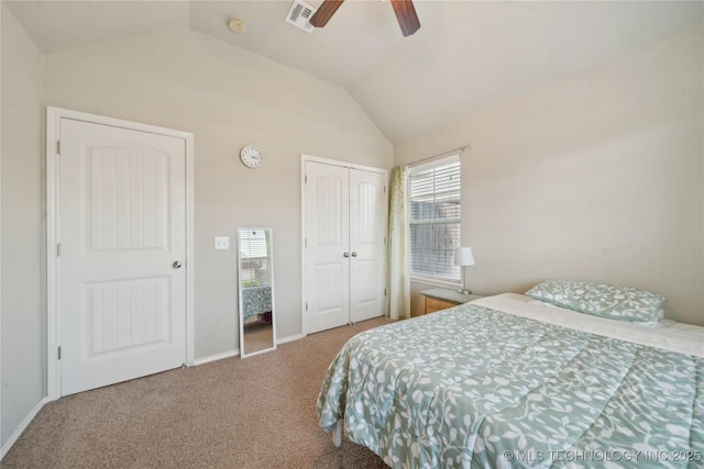 bedroom with carpet flooring, a ceiling fan, baseboards, lofted ceiling, and visible vents