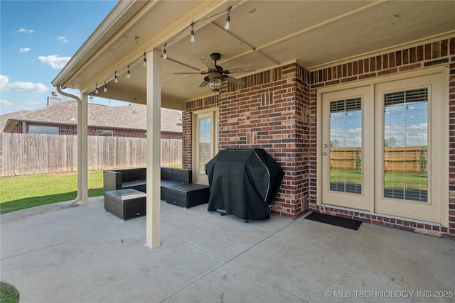 view of patio / terrace with an outdoor living space, a ceiling fan, fence, and area for grilling