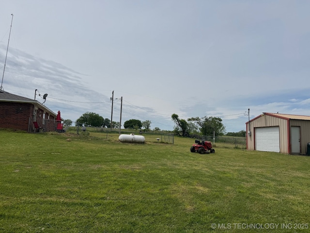 35617 W 261st St S, Bristow, OK 74010 - view of yard featuring a detached garage, an outdoor structure, and driveway