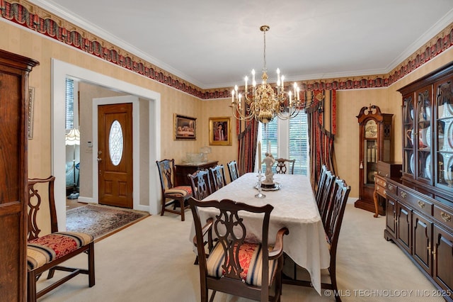 dining area with an inviting chandelier, light carpet, baseboards, wallpapered walls, and ornamental molding
