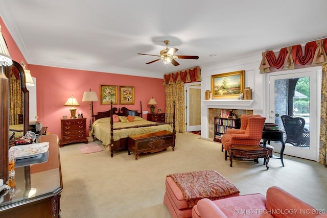 carpeted bedroom featuring access to outside, ornamental molding, and ceiling fan