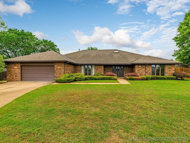 ranch-style home featuring brick siding, a garage, fence, and driveway