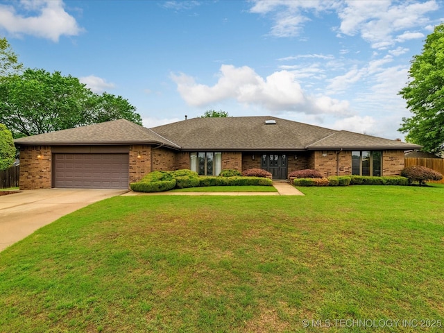 single story home featuring fence, an attached garage, concrete driveway, and brick siding